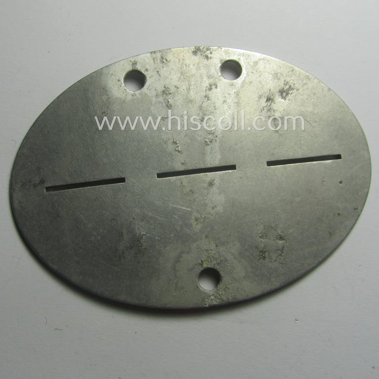 Aluminium-based, WH (Heeres) 'Gebirgsjäger- o. Panzer-Abwehr'-related ID-disc bearing the clearly stamped unit-designation that reads: '1./Geb.Pz.Abw.Abt. 44' and that comes as issued and/or worn