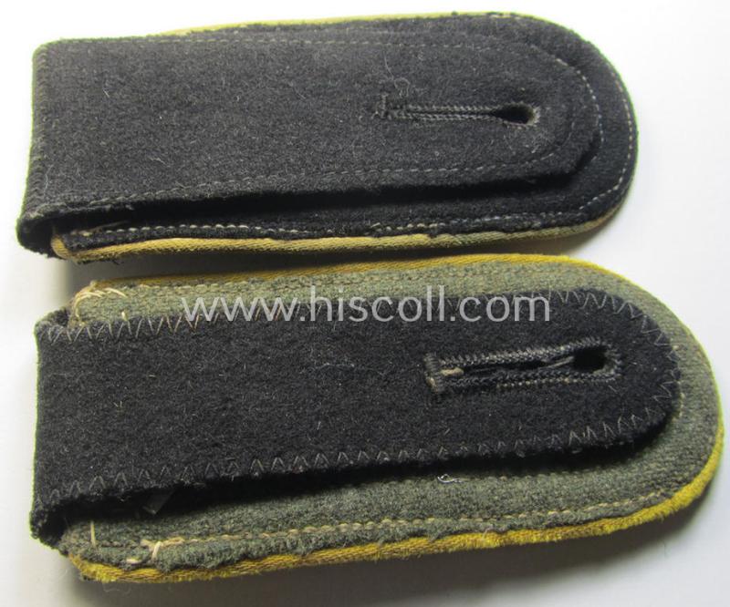 Attractive - truly worn albeit mis-matched! - pair of Waffen-SS, NCO-type shoulderstraps as piped in the bright-yellow-coloured branchcolour as was intended for usage by an: 'SS-Hauptscharführer' who served within the: 'SS Nachrichten-Truppen'
