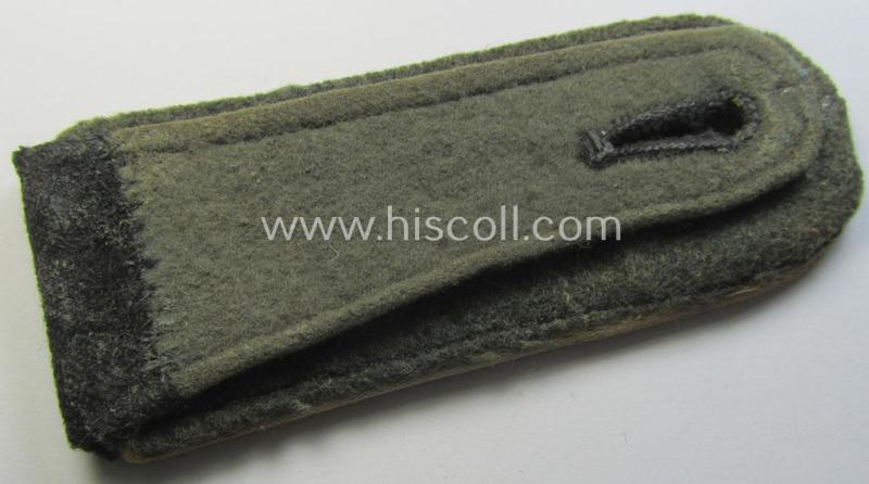 Attractive - albeit regrettably single! - Waffen-SS, EM-type shoulderstrap as piped in the white-coloured branchcolour as was intended for usage by an: 'SS-Mann' who served within the: 'SS-Infanterie-Truppen'