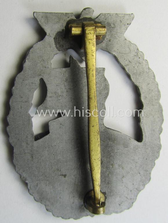 WH (KM) 'Hilfskreuzer-Kriegsabzeichen' (or: auxiliary-cruiser war-badge) being a typical, non-maker-marked- and/or: 'Feinzink'-based example as was produced by the: 'S&L'-company