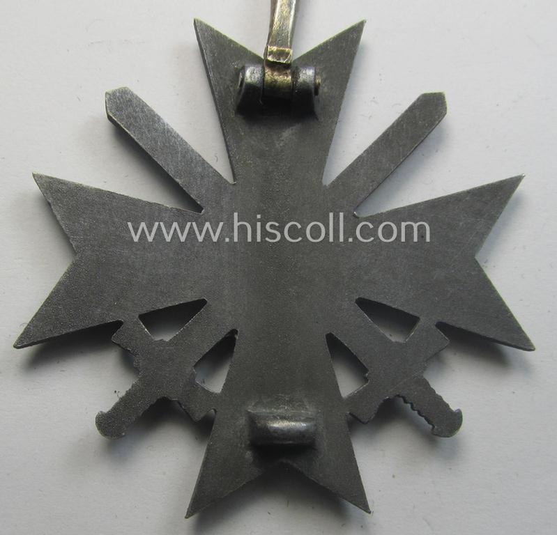 'Kriegsverdienstkreuz 1. Klasse mit Schwertern' being a non-maker-marked specimen by a (by me) unidentified maker as executed in silverish-grey-coloured and/or typical zinc-based metal (ie. 'Feinzink')