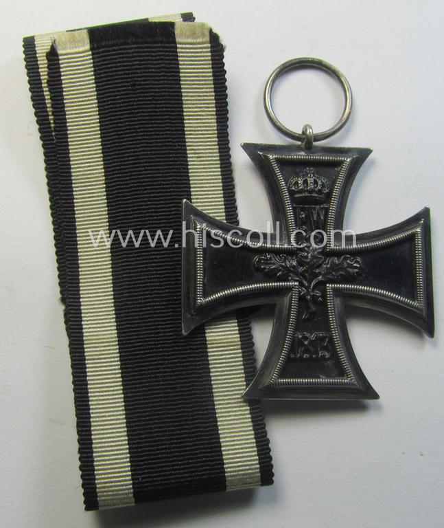 Attractive, WWI-period: 'Eisernes Kreuz II. Klasse' (or: iron cross second class) being a typical maker-marked example that comes together with its (minimally) confectioned but long-sized piece of ribbon (ie. 'Bandabschnitt')