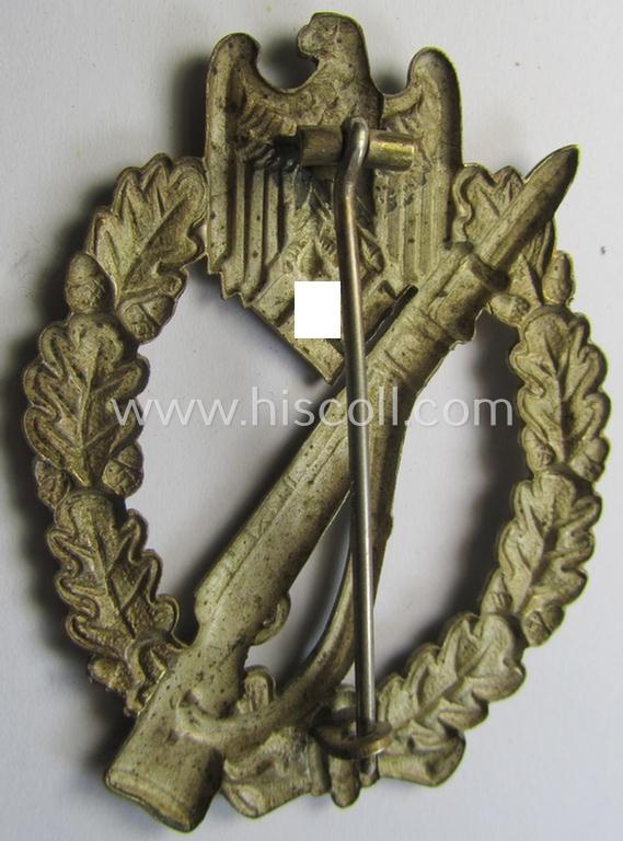 'Infanterie Sturmabzeichen in Silber' (or: silver-class infantry-assault-badge ie. IAB) being a 'Buntmetall'-based example by the: 'Otto Schickle'-company
