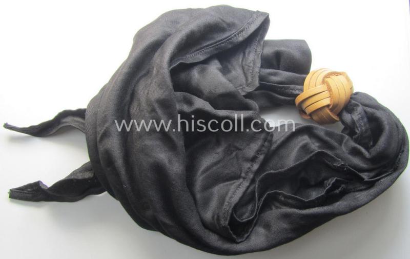 'HJ' ('Hitlerjugend') ie. 'BDM' (or: 'Bund Deutscher Mädel') so-called: 'Halstuch' as executed in typical black-coloured linnen still retaining its period RzM-etiket (and that comes with its leather-based 'Knote')