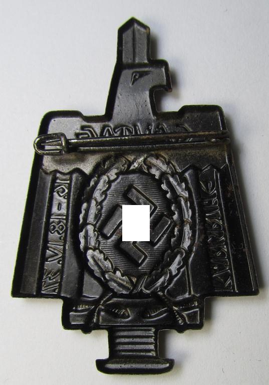 Commemorative, tin-based- and/or: bright golden-toned (I deem) N.S.D.A.P.-related 'tinnie' depicting an eagle-device resting on an upward-positioned sword and that is entitled: 'Gautag - Karlsruhe - 16.18. IV 1937'