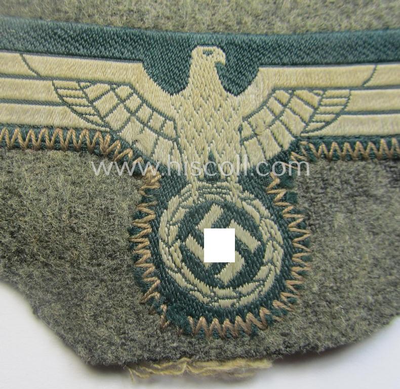 'Cut-out of a tunic' - WH (Heeres) EM- (ie. NCO-) type breasteagle (ie. 'Brustadler für Mannschaften und Unteroffiziere des Heeres')