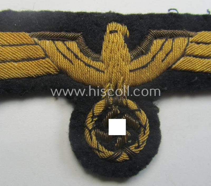 WH (Kriegsmarine) officers'-type, hand-embroidered breast-eagle (ie. 'Brustadler für Offiziere') as was executed in bright-golden-coloured braid and so-called: 'Cellueon'-based material