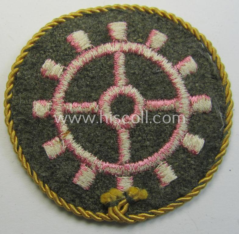 WH (Heeres ie. 'Panzer'-) trade- ie. special-career-patch having a golden-yellow-coloured 'Kordel' (ie. 'Umrandung') attached as was intended for a: 'Panzerwarte o. Kfz.-Warte o. Handwerker' (aka 'KFZ-Technisches Personal')
