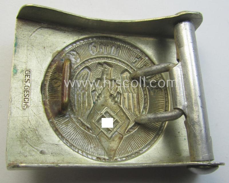 HJ (ie. 'Hitlerjugend') bright-silver-coloured- (ie. nickle-chrome-based and early-pattern) belt-buckle being a neatly maker- (ie. 'Ges.Gesch.'-) marked example