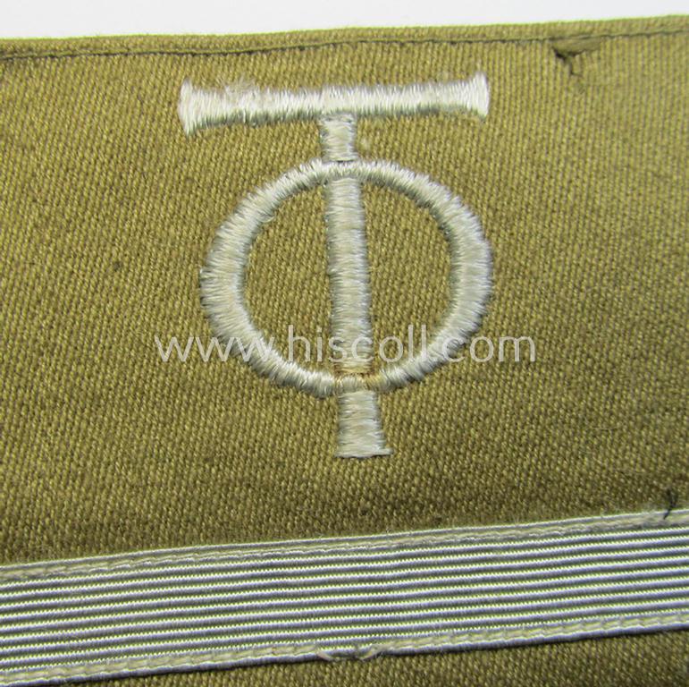 Attractive - and actually scarcely seen! - single example of an OT- (ie.: 'Organisation Todt'-) related golden-brown-coloured, (I deem) officers'-pattern rank-patch (ie. 'OT-Dienstgraden-Abzeichen')