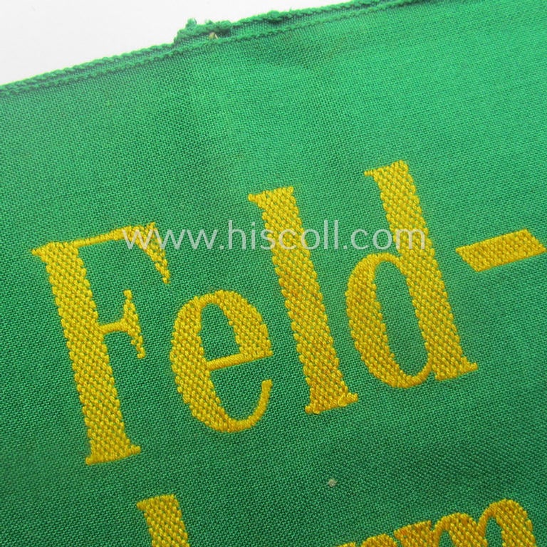 Wehrmacht-related, bright-green-coloured and/or linnen-based armband entitled: 'Feldgendarmerie' (as was specifically intended for usage by the staff of the notorious: 'Feldgendarmerie-Truppen')