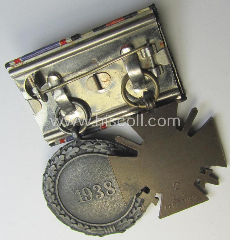 Unusually found, two-pieced (detachable!) medal-bar (ie. 'Doppelspange') respectively depicting a WWI-period: 'Frontkämpferkreuz 1914-18' (ie.: 'Kriegsteilnehmerkreuz mit Schw.') and a: 'Luftschutz-Ehrenzeichen 2. Stufe'