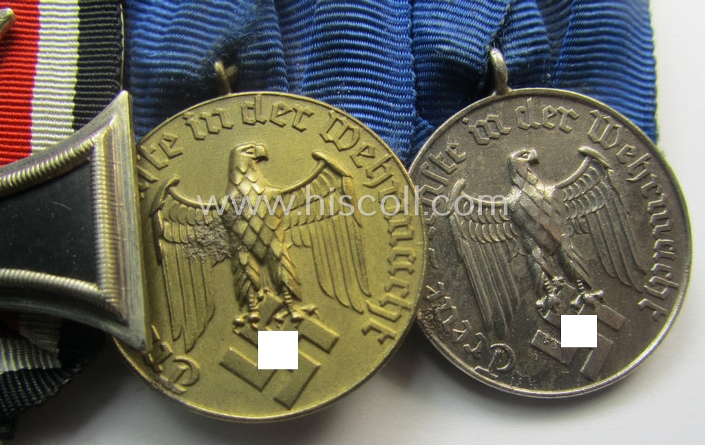 Superb, 3-pieced medal-bar (ie. 'Ordenspange') resp. showing an: 'EK II.Kl.' (in the scarcely seen 'Schinkel'-pattern!) and two WH (Heeres or KM) so-called: 'DA für 4 u. 12 Jahre treue Dienste'