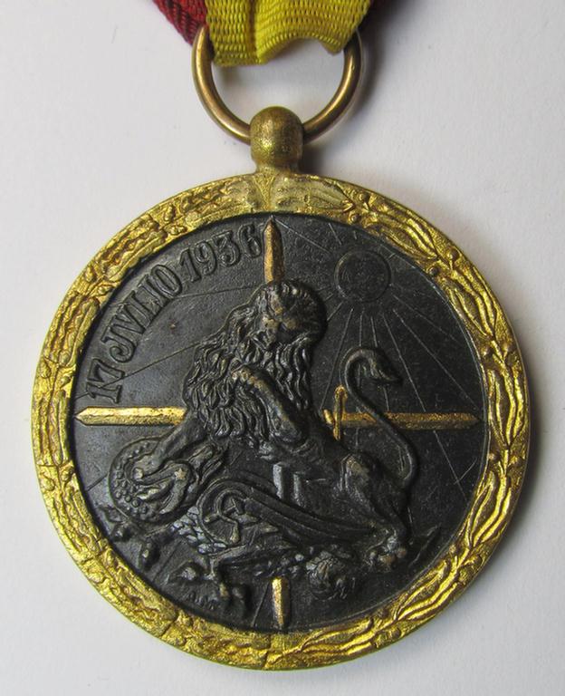 Spanish-issued, Spanish Civil-War commemorative-medal called: 'Medalla de la Campaña 1936-1939' that comes mounted onto its (typically Spanish) mounted ribbon and that comes in a wonderful and hardly used condition