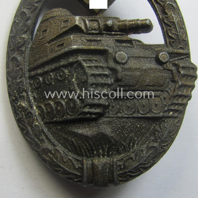 'Panzerkampfabz. in Bronze' (or: bronze-class panzer assault-badge or PAB) being a zinc- (ie. 'Feinzink'-) version (having a so-called: 'horizontal'-catch-set-up) as was procuced by the: 'Steinhauer u. Lück' (ie. 'S.& L.') company