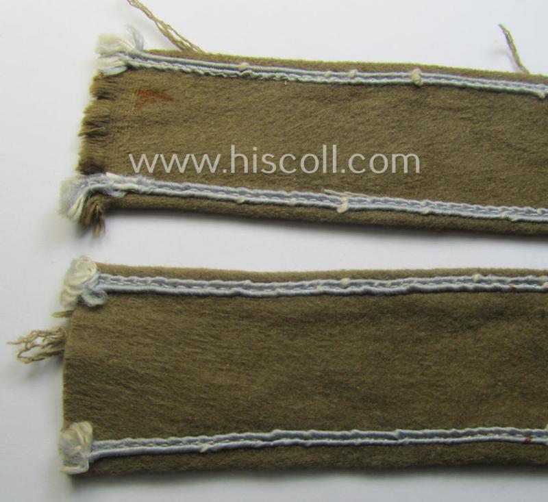 WH (LW o. Heeres) cuff-title (ie. 'Ärmelstreifen') entitled: 'Afrika' (being an example that comes in a presumably issued- albeit simply never used- ie. 'virtually mint' condition)