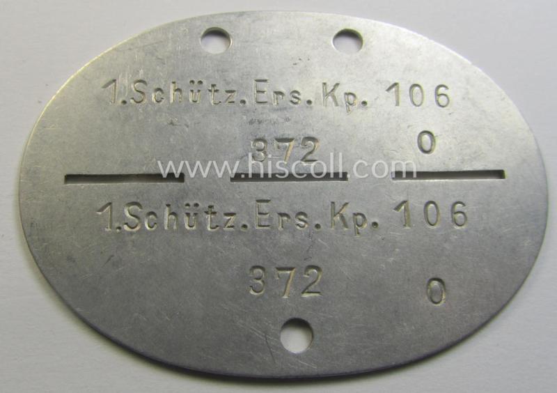 Unusual insignia-grouping comprising of a matching pair of WH (Heeres) officers'-type shoulderboards: 'Oberleutnant eines Inf.-Rgts.' that comes with its accompanying ID-disc (bearing the unit-designation: '1. Schütz.Ers.Kp. 106')