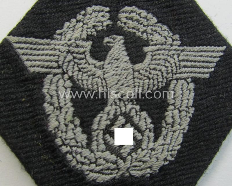 Superb, Waffen-SS-pattern, neatly 'BeVo'-woven and/or black-coloured sleeve-insignia (ie. 'Ärmelraute') depicting a so-called: 'Polizeiadler' as was used and intended to signify former membership within the: 'Polizei'