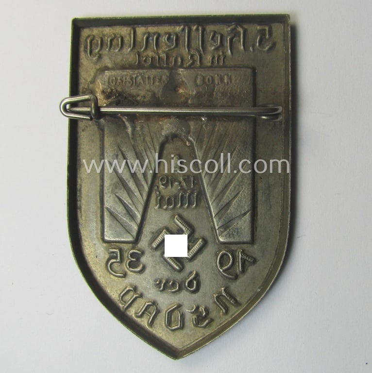 Commemorative, silver-toned N.S.D.A.P.-related 'tinnie' being a maker- (ie. 'Hofstätter-Bonn'-) marked example depicting a monument and showing the text: '5. Hessentag der N.S.D.A.P. in Kassel - 17.19. Mai 1935'
