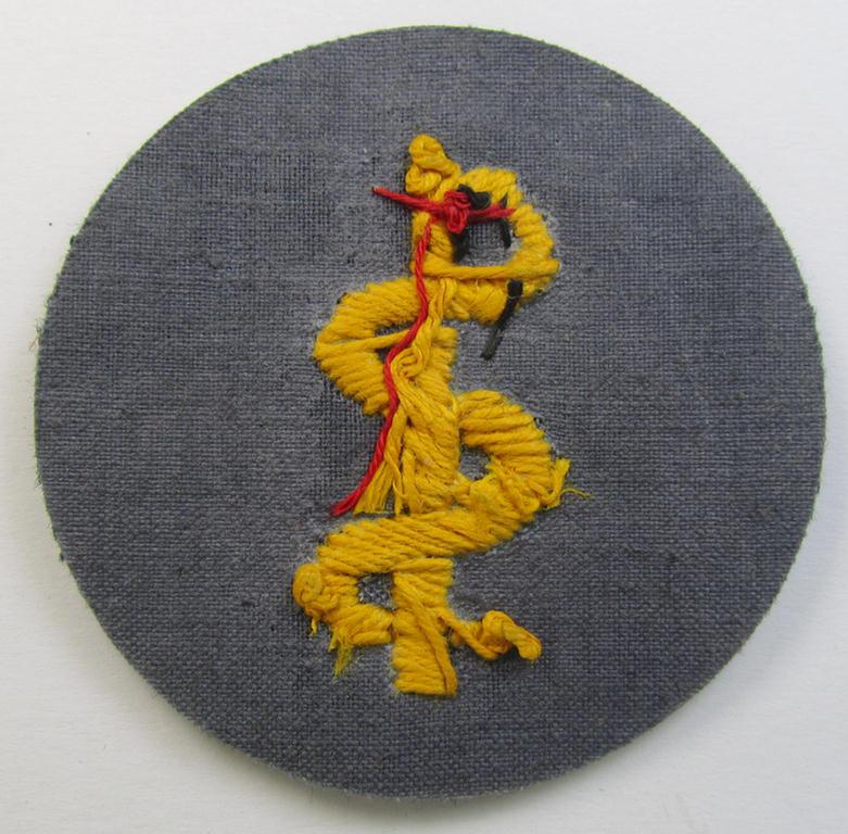 Neatly hand-embroidered WH (Heeres) trade- and/or special-career insignia (ie.: 'Heeres-Tätigkeitsabzeichen') as was specifically intended for usage by: 'Sanitätspersonal' (or: medical orderlies- ie. staff)