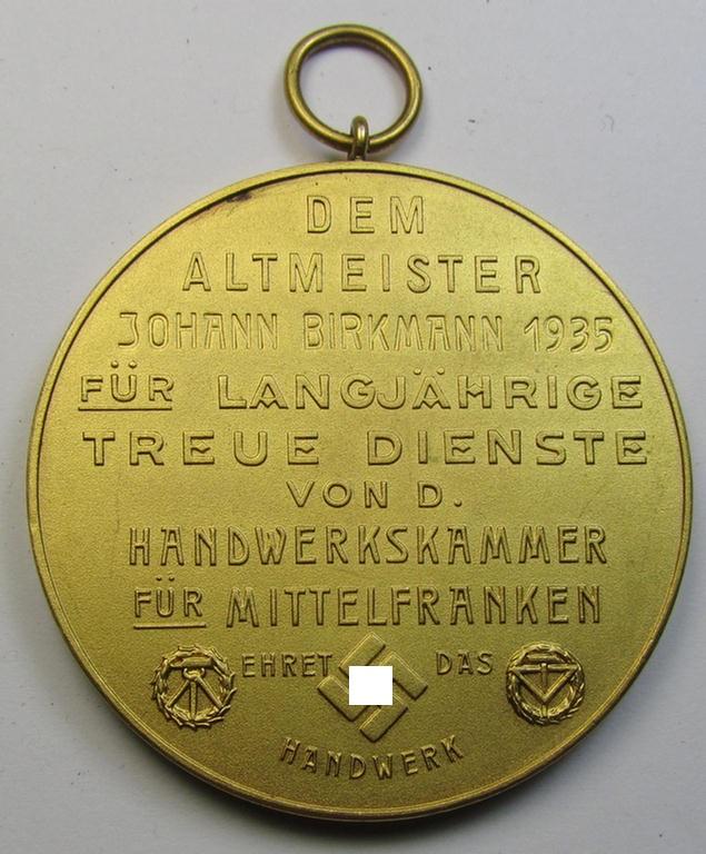 Larger-sized, TR-period, bright-golden-toned commemorative-plaque (ie. 'Erinnerungs- o. Auszeichnungsmedaille') showing the text: 'Dem Altmeister Johann Birkmann 1935 - Handwerkskammer für Mittelfranken'