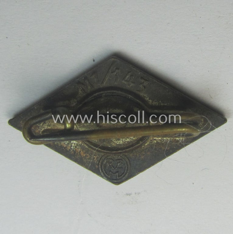 HJ (ie. 'Hitlerjugend') enamelled lapel-pin (ie.: 'Raute') with a: 'RzM-M1/143'-makers'-designation