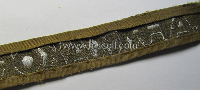 Attractive, 'BeVo'-like cuff-title (ie. 'Ärmelstreifen') entitled: 'Afrikakorps' being a with certainty issued and truly worn example that comes in an overall nice- (ie. minimally shortened- and/or once tunic-attached-), condition