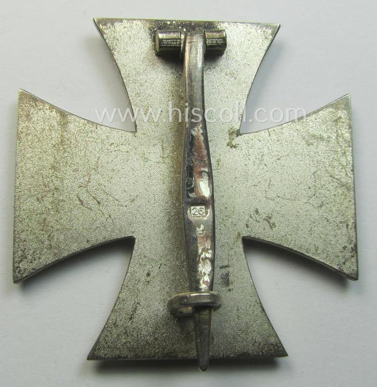'Eisernes Kreuz 1. Klasse' (ie. Iron Cross 1st class) being an (I deem) early-war-period produced- and '26'-marked (ie. by: 'B.H. Mayer's Kunstprägeanstalt'-produced) example and that comes complete in its specific etui