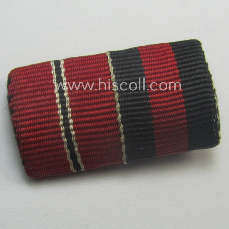 Neat - and simply never issued- nor worn! - dual-pieced WWII-period ribbon-bar (ie. 'Feld- o. Bandspange') as was intended for combination: 'Ost'-medal (ie. 'Medaille Winterschlacht im Osten 1941-42') and Czech 'Anschluss'-medal '1. Oktober 1938'
