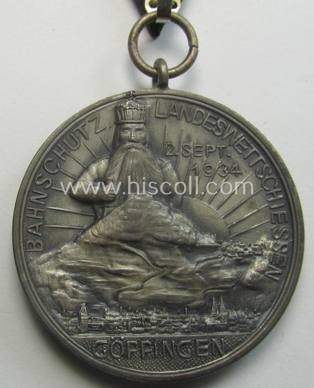 Most certainly unusually found, silver-toned, 'Bahnschutz'- (ie. railway-protection-service-) related commemorative shooting-contest medal entitled: 'Bahnschutz Landeswettschiessen - Göppingen - 2.Sept. 1934'