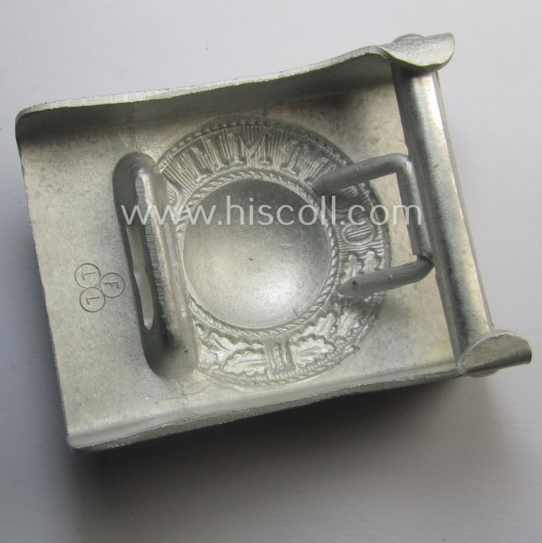 Very unusual - and actually never before seen! - aluminium-based WH belt-buckle (ie. 'Koppelschloss für Mannschaften u. Uffz.') being a maker- (ie. 'F.L.L.'-) marked example that comes in a fully untouched, condition