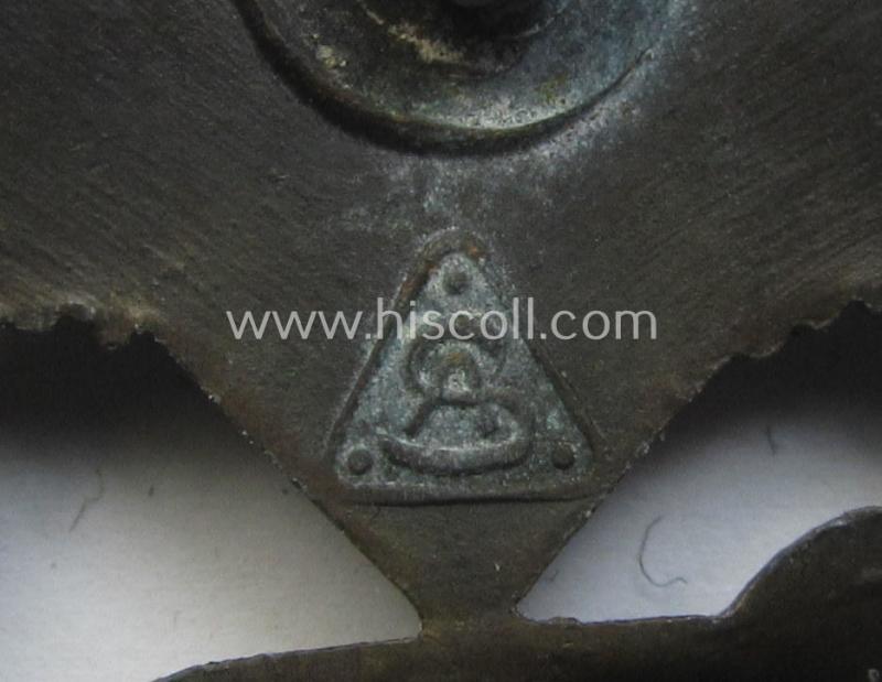'Panzerkampfabzeichen in Bronze' (or: bronze-class panzer-assault badge or PAB) being a clearly maker- (ie. 'AS' in a triangle-) marked- and/or typical zinc- (ie. 'Feinzink'-) based specimen as was procuced by a to date unknown maker