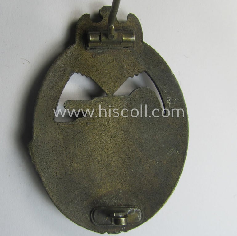 'Panzerkampfabz. in Bronze' (or: bronze-class panzer assault-badge or PAB) being a zinc- (ie. 'Feinzink'-) version (having a so-called: 'horizontal'-catch-set-up) as was procuced by the: 'Steinhauer u. Lück' (ie. 'S.& L.') company