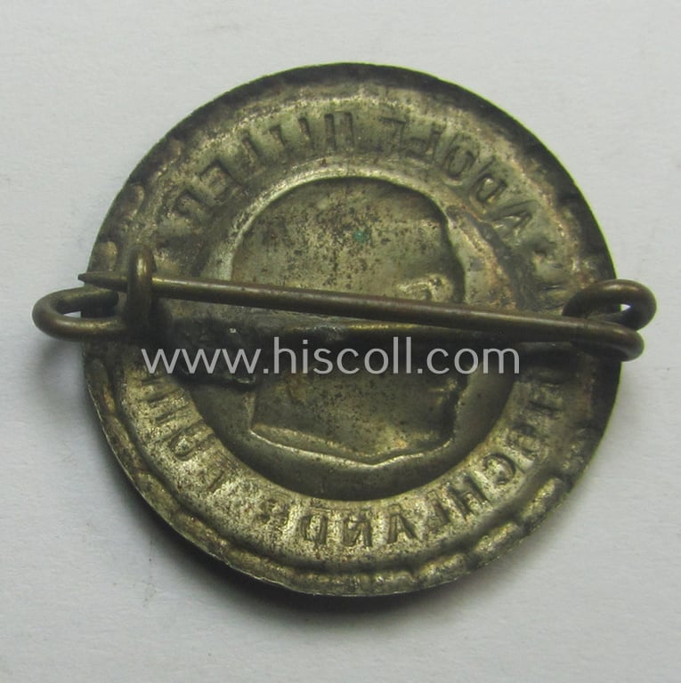 Unusual, silver-toned so-called: patriotic-styled, commemorative tinnie (ie: 'Veranstaltungsabzeichen') that shows the portrait of the: 'Reichskanzler' Adolf Hitler and text: 'Adolf Hitler - Deutschlands Führer'