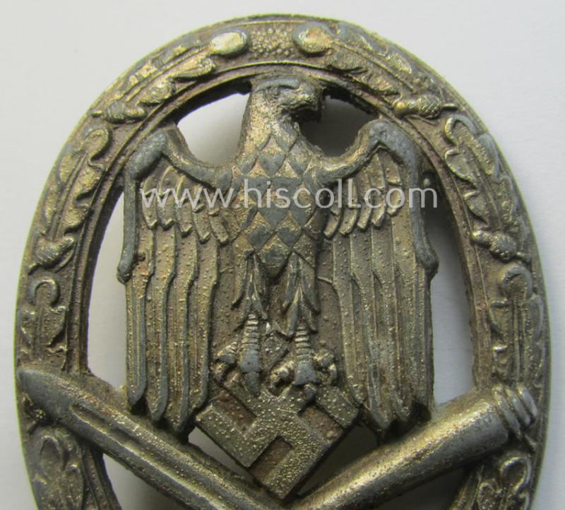 'Allgemeines Sturmabzeichen' (or: General Assault Badge ie. GAB) being a typical unmarked, zinc-based- (ie. 'Feinzink'-) and/or: 'semi-hollow-back'-version as was (I deem) produced by the: 'Rudolf Karneth'-company