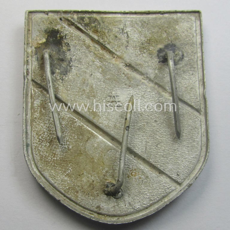 WH (Heeres) tropical- (ie. 'DAK'- or: 'Deutsches Afrikakorps'-) related- and/or aluminium-based, national-colours 'pith-helmet'-shield being a maker- (ie. 'A'- or  'Assmann & Söhne'-) marked example that comes in a clearly used-, condition