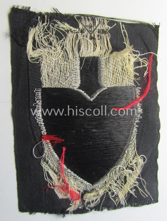 Attractive - and actually very scarcely encountered! - officers'-pattern, so-called: RAD (ie. 'Reichsarbeitsdienst') sleeve-badge (or: 'Dienststellenabzeichen') bearing the specialist-designation: 'M' (or: 'Hauptmeldebeambter')