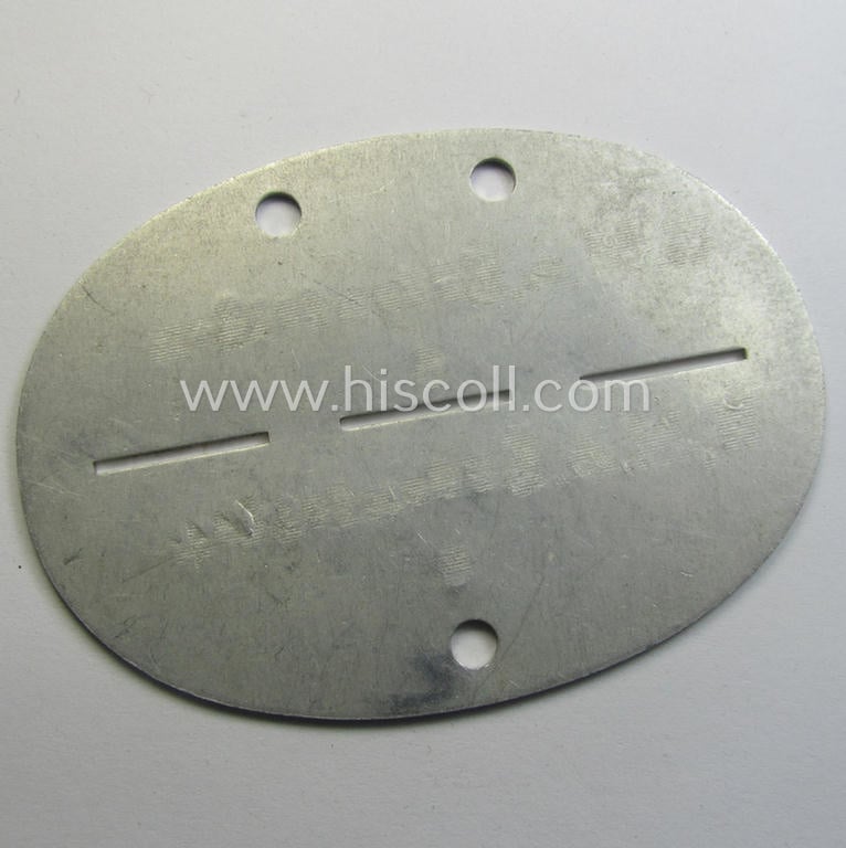 Aluminium-based, generic 'Deutsche Wehrmacht'-related ID-disc bearing the clearly stamped unit-designation that simply reads: 'W.M.A. Eggenfelden' and that comes as issued- and/or worn