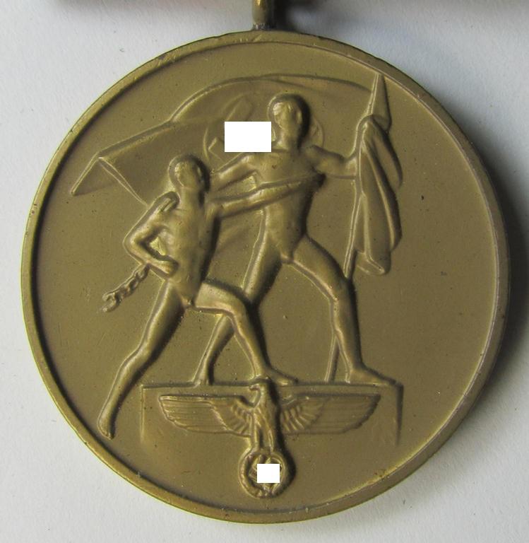 Neat, bright golden-toned WH (Heeres o. KM etc.) so-called: 'Einzelspange' (being of the 'standard-issued'- ie. 'detachable'-pattern) showing a WH Czech 'Anschluss'- (ie. occupation-) medal: '1 October 1938'