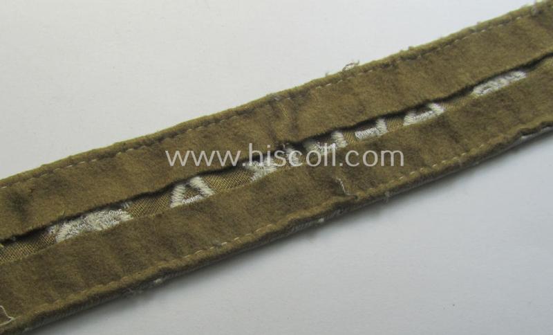 Moderately used WH cuff-title (ie. 'Ärmelstreifen') entitled: 'Afrika' (being a minimally shortened example that comes in an overall very nice- (ie. issued and clearly worn ie. once tunic-attached-), condition
