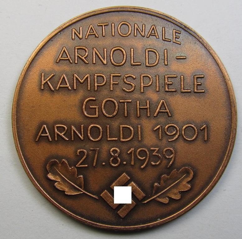 Commemorative, reddish-bronze-toned- (and I deem 'Buntmetall'-based) - TR-period sports-plaque (ie. 'Erinnerungs- o. nichttragbare Auszeichnungsplakette') showing the text: 'Nationale Arnoldi Kampfspiele Gotha - Arnoldi 1901 - 27-8-1939'