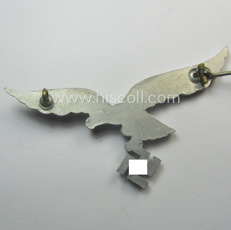 WH (Luftwaffe) aluminium-based breast-eagle as was specifically intended for usage on the white summer-tunics (ie. 'Brustadler für Sommerrock') being a detailed- albeit non-maker-marked specimen