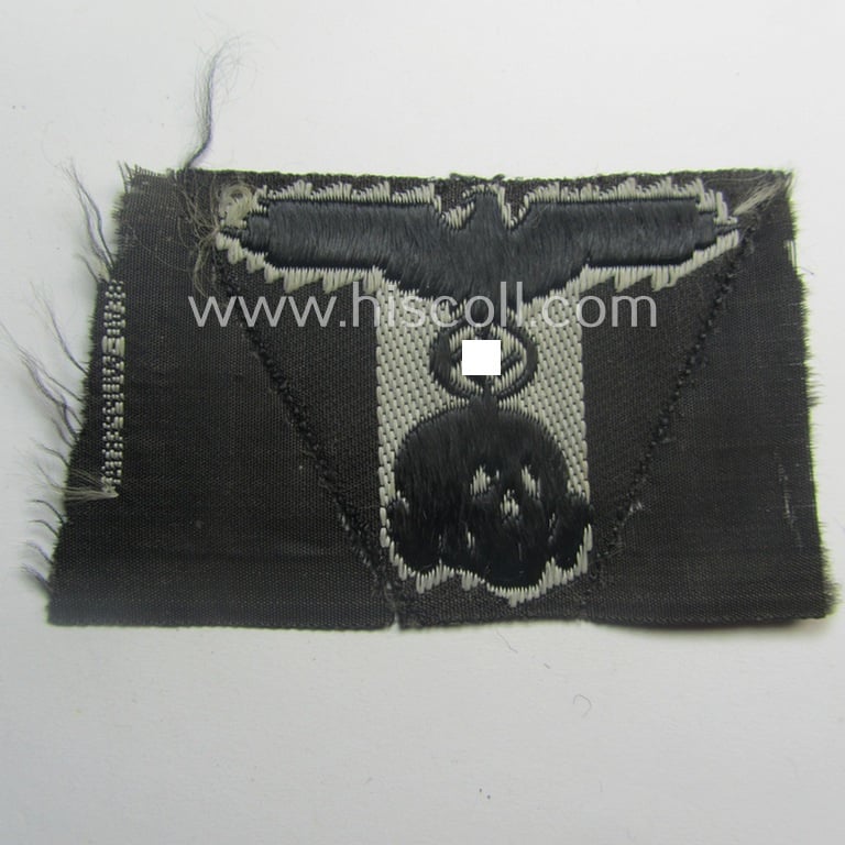 Truly used and worn, Waffen-SS black-coloured 'M43'-pattern 'Panzer'-cap-trapezoid as executed in 'BeVo'-weave-pattern as was specifically intended for usage on the 'M43'-model field-caps (ie. 'Einheitsfeldmützen')