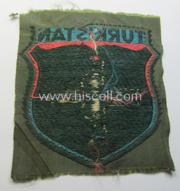Attractive, 'BeVo'-type armshield entitled: 'Turkistan' (being of the scarcely encountered third and final pattern!) that was intended for a volunteer who served within the: 'Deutsche Wehrmacht' ie. within the: 'Turkistanisches Legion'