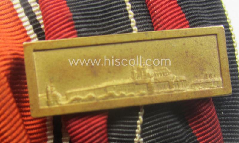 Two-pieced, WH (Heeres o. Kriegsmarine) medal-bar (ie.: 'Doppelspange') showing resp. an Austrian and Czech 'Anschluss'-medal (which latter comes with a firmly attached 'Prager Burg-Spange')