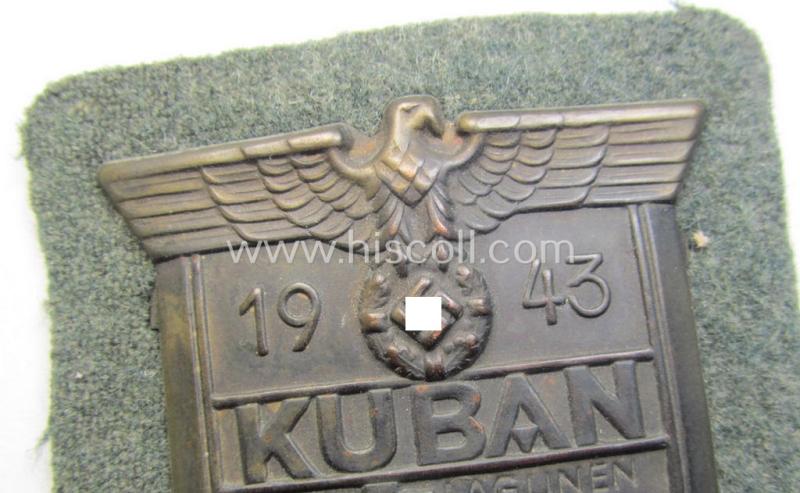 Very attractive - and actually scarcely encountered! - WH (Heeres ie. Waffen-SS) 'Kuban'-campaign-shield that comes mounted onto its original field-grey-coloured- and/or woolen-based 'backing'