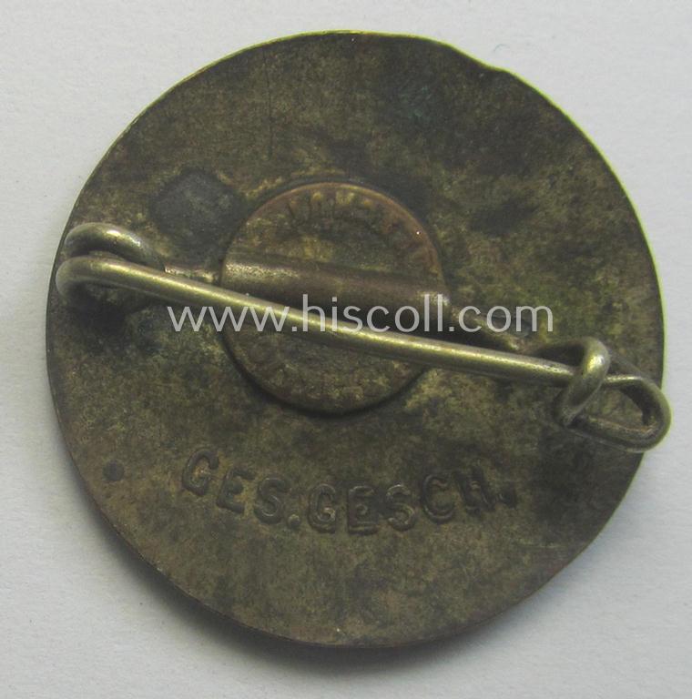 Early-pattern 'N.S.D.A.P. - Parteiabzeichen' showing a (double!) so-called: 'Ges. Gesch.'-patent-pending-designation