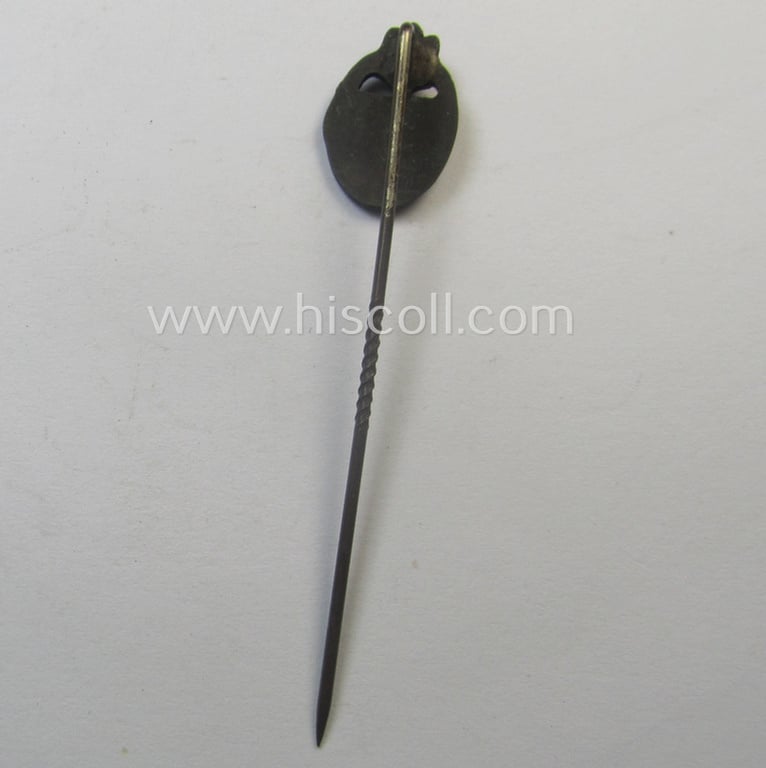 Neat - and 17 mm. sized! - miniature-lapel-pin depicting a: 'Panzerkampfabzeichen in Bronze' (or: bronze-class panzer-assault-badge ie. PAB) being a non-maker-marked example as executed in darkened, bronze-coloured metal