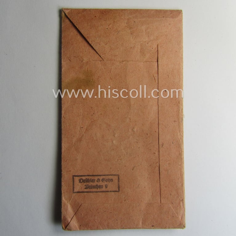 Empty 'Zellstoff'-based pouch as was intended for a medal: 'Winterschlacht im Osten 1941/42' as was produced by the company: 'Deschler & Sohn - München' (ie. 'Hersteller 1')