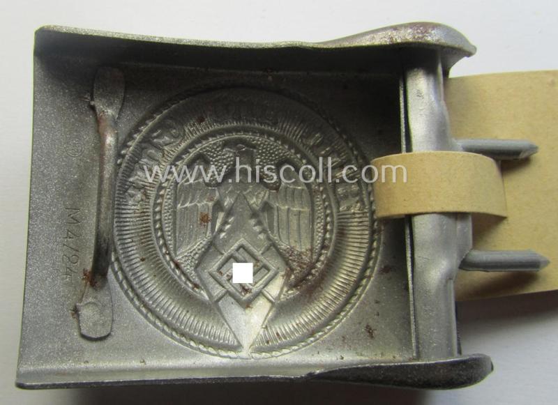 'Virtually mint' - and actually very scarcely encountered! - 'HJ- o. Hitlerjugend'-belt-buckle being a clearly maker- (ie. 'RzM M4/24'- ie. 'FLL') marked example that comes with its period-attached makers'-etiket